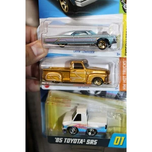 HOT WHEELS BLUE LAYIN' LOWRIDER Car Tuned ‘85 Toyota SR5 LA TROCA Gold #116 (S1 - Picture 1 of 5