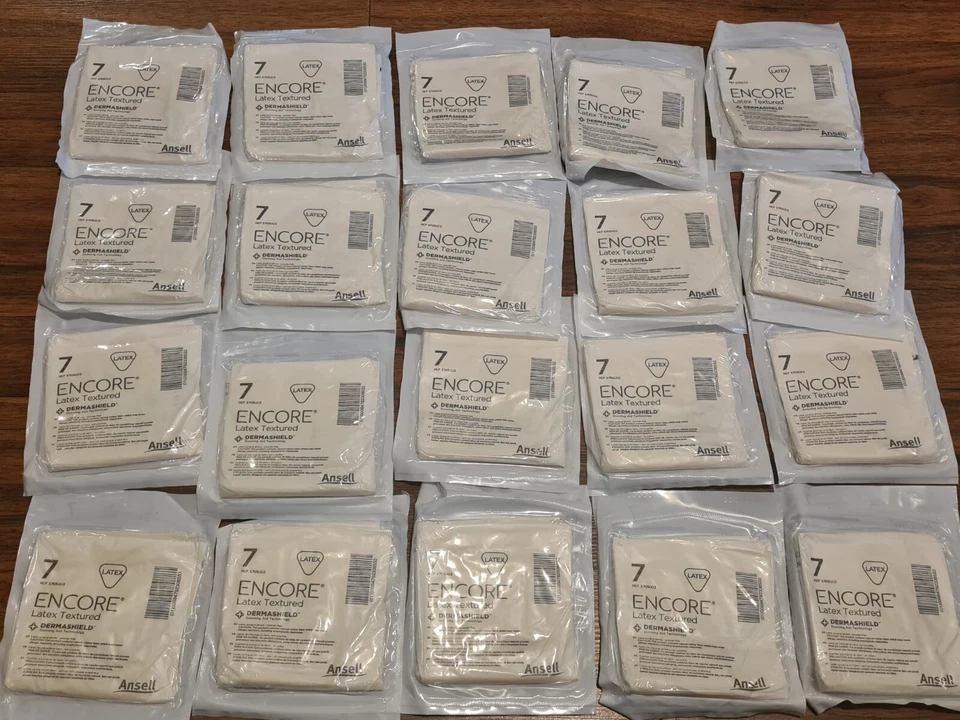 10/20 pares de guantes quirúrgicos de látex texturizados DermaShield sin polvo Encore 7 Foto 1 de 1