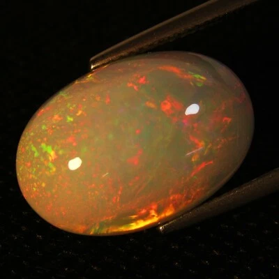 10.84Cts Natural Earth Mined Color Play Ethiopian Opal Oval Cabochon Gem Ref VDO - Image 1 of 4
