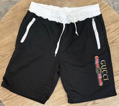 男孩 M 码 "Faux" 古驰运动短裤黑色带抽绳 - A2000 — 第 1/4 张图片