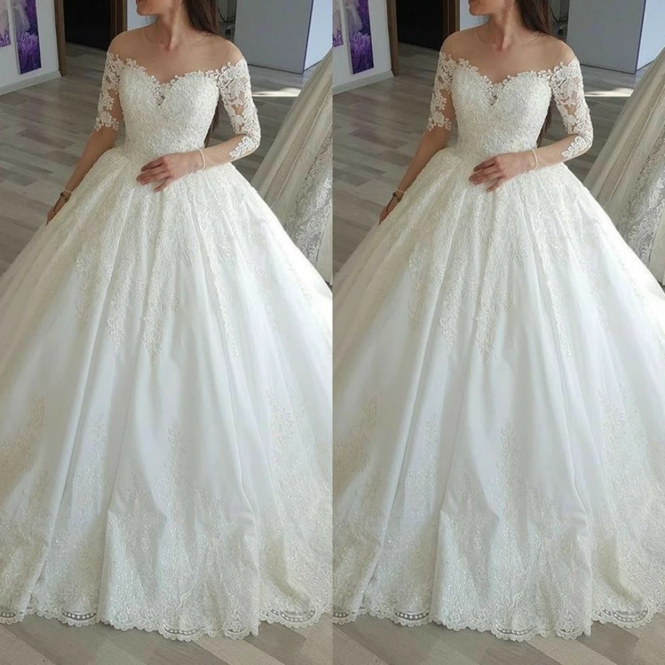 Vestidos de novia clásicos con apliques de encaje mangas 3/4 sin hombros descubiertos Foto 1 de 4