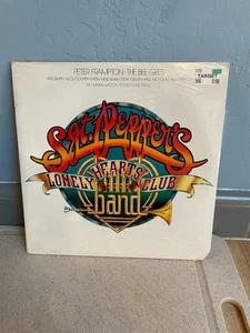 SGT. PEPPER’S LONELY HEARTS CLUB BAND SOUNDTRACK LP SEALED BEE GEES AEROSMITH - Picture 1 of 2