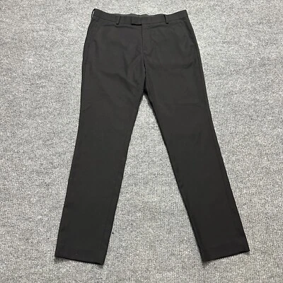 Pantalones de vestir H&M ajustados para hombre talla 34R negros frente plano informales tiro medio Foto 1 de 4