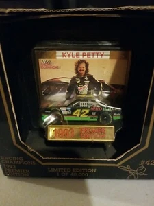 1993 KYLE PETTY #42 MELLO YELLO 1:64 RACING CHAMPIONS DIE-CAST CAR  NEW - Picture 1 of 4