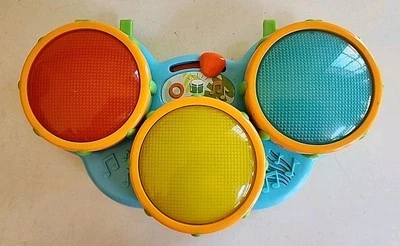 Bright Starts Safari Beats Juguete de Aprendizaje Musical Tambores Sonidos de Animales Luces de Empuje Foto 1 de 2