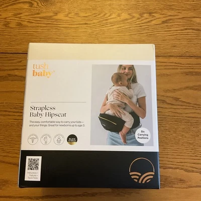 Nuevo portabebés sin tirantes Tushbaby negro y dorado recién nacidos niños pequeños Foto 1 de 4