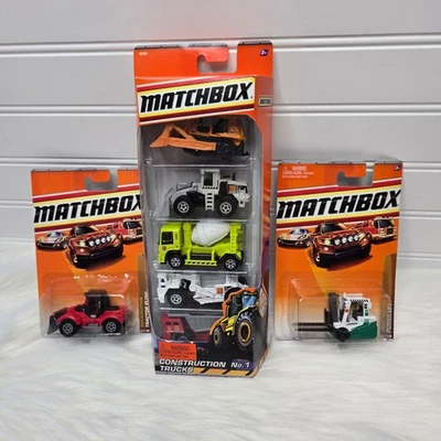 Lot of 7 Matchbox Construction No 1 Trucks, Power Lift & Tractor Plow New In Box - Image 1 of 4