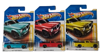 2011 Hot Wheels New Models #29 ‘63 Studebaker Champ Yellow Red Blue Lot of 3 - Image 1 of 2