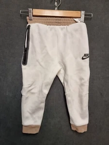 nike tech fleece pants size 5 small beige white zip pockets - Picture 1 of 9