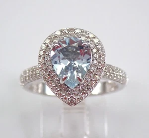 Anillo de compromiso de oro blanco de 14 quilates con halo de diamantes y aguamarina piedras preciosas Aqua March - Imagen 1 de 9