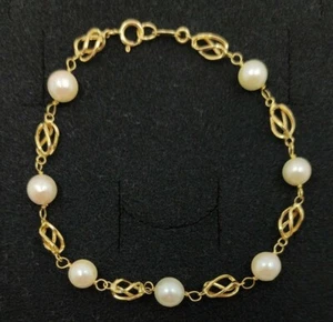 Pulsera oro 18k 750 mls. 7 perlas de 5,5 mm. 17,5 mm. - Imagen 1 de 5