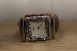 DKNY WATCH NY8185 ENCRUSTED CRYSTAL BEZEL WHITE CERAMIC CASE NEW BATT - Picture 1 of 6