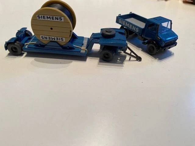 Wiking MB Unimog mit Tieflader + Ladung Kabelrolle  " Siemens " Blau 1:87 HO - Bild 1 von 1
