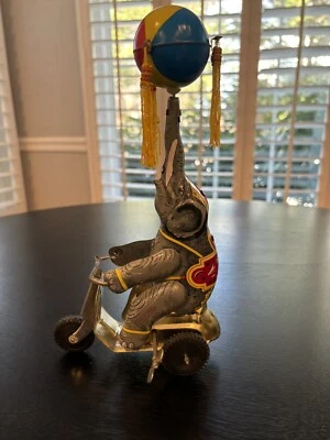 Vintage Wind-up Tin Toy Circus Elephant on Bike w/Spinning Tassel - Works - Image 1 of 3