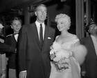 Joe DiMaggio with Marilyn Monroe 1955 Photo - Marilyn Monroe and Joe DiMaggio. T