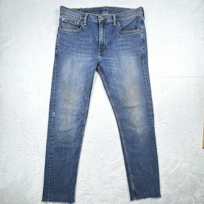 Pantalones de mezclilla Levi's 502 para hombre 33x32 azul regular cónico deshilachado dobladillo crudo desgastado Foto 1 de 4