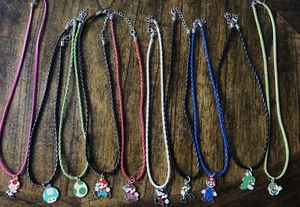 Super Mario Bros. Necklaces. Lot of 10. 16 to 18” leather (8) and suede(2) chain - Picture 1 of 9