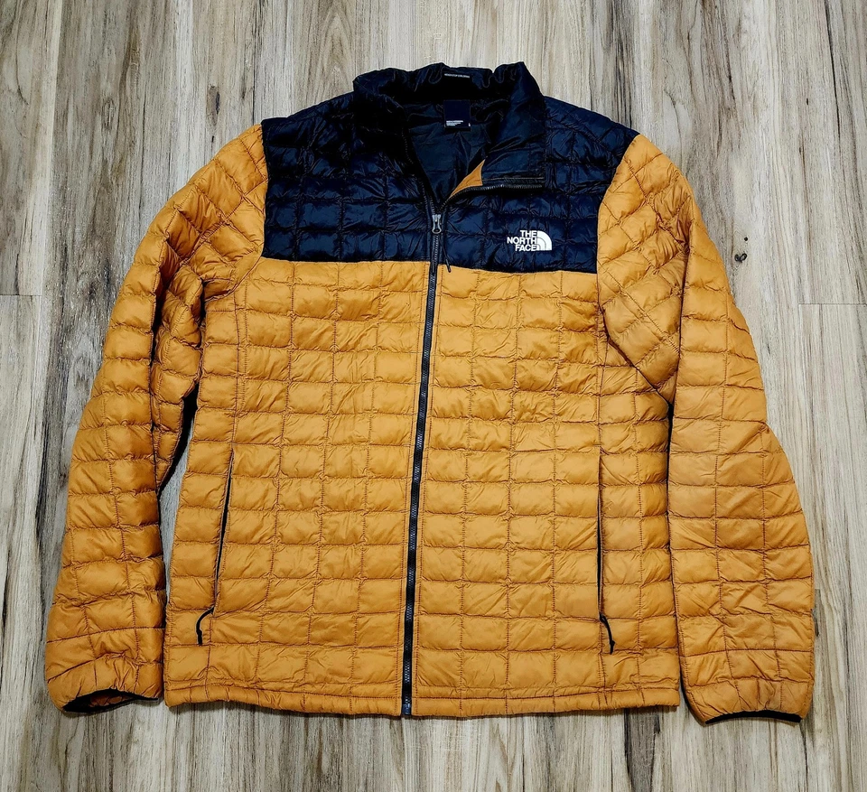 Chaqueta acolchada The North Face ThermoBall Eco para hombre negra amarilla talla L Foto 1 de 4