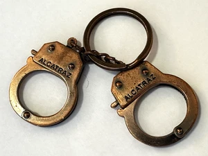Alcatraz Handschellen Schlüsselanhänger Kupfer Gefängnisinsasse Neuheit Geschenk - Bild 1 von 6
