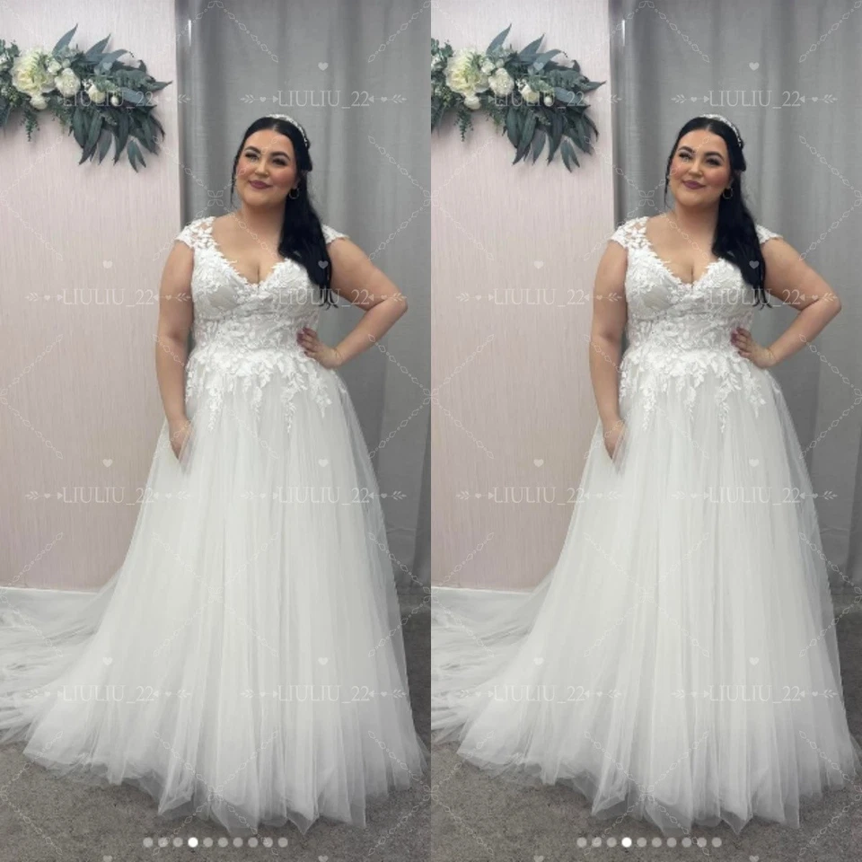 Vestidos de novia talla grande manga gorra línea A cuello en V apliques de encaje vestidos de novia Foto 1 de 4