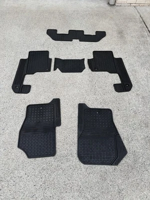 Juego de alfombrillas de goma Land Rover LR4 OEM - 8 piezas protección contra todo tipo de clima (usadas) Foto 1 de 4