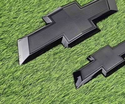 2015-2020 Chevrolet Tahoe Suburban Front and Rear Gloss Black Bowtie Emblem 2pcs - Image 1 of 4