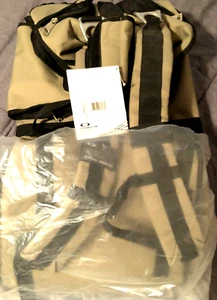 NWT OAKLEY DRY GOODS 68L DUFFEL Desert Tan w/ Black Tactical Gear Backpack Bag - Picture 1 of 6
