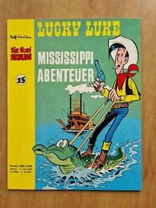 ÁLBUM FIJO Y FOXI 15 / LUCKY LUKE / AVENTURA MISSISSIPPI / ROLF KAUKA - Imagen 1 de 3