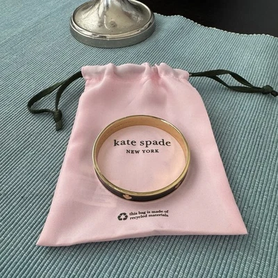 Pulsera Kate Spade negro y oro Foto 1 de 4