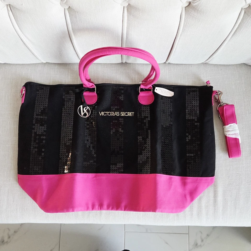 BOLSO BANDOLERA DE VIAJE DE FIN DE SEMANA CON CREMALLERA NEGRO Y ROSA VICTORIA'S SECRET  Foto 1 de 4