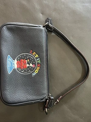 Bolso de mano Coach X Peanuts CE859 Nolita 19 con bolsa de nieve Snoopy Let It Foto 1 de 4