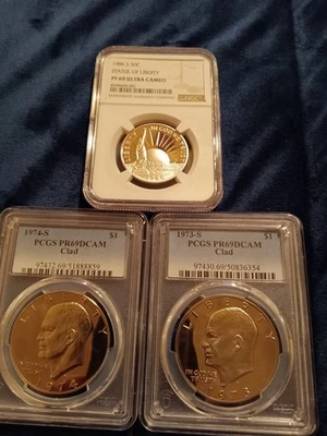Lot of 3 1986S Statue of Liberty PF 69 U.C 1973S,1974SPCGS69 DCAMSClad Eisenhow. - Image 1 of 4