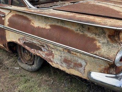 Chevrolet Bel Air 1959 sedán conductor cuarto izquierdo panel cromo moldura lanza Foto 1 de 4