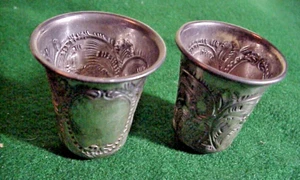 A pair of ANTIQUE STERLING SILVER Jigger SHOT GLASSES with Fancy Designs - Picture 1 of 11
