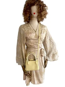 Olivia & Co Hero Bag | Vegan Leather, Top Handle Cross Body, Pastel Yellow - Picture 1 of 7