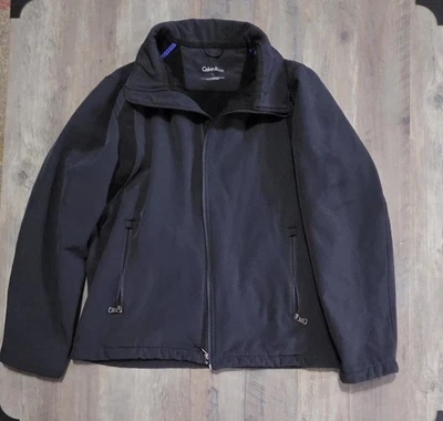 Chaqueta cortavientos con cremallera resistente al agua Calvin Klein forrada elástica para hombre S negra Foto 1 de 4