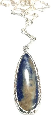 COLLANA LAVORAZIONE RUSTIC IN ARGENTO E GOCCIA DI SODALITE - Immagine 1 di 4