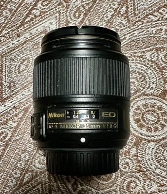 Nikkor Nikon AF-S 35mm F1.8 FX G ED Lens w/ Caps, Filter, Hood and Pouch Exc - Image 1 of 4