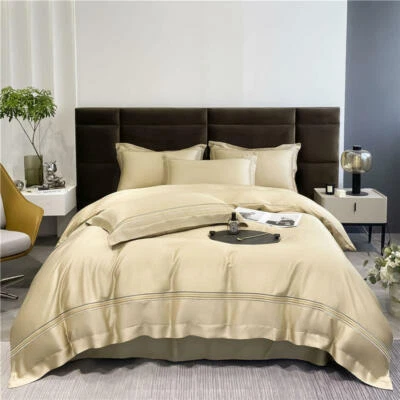 Juego de cama 4 piezas de lujo puro sedoso tencel bordado funda nórdica juego de sábanas planas Foto 1 de 4