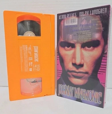 Johnny Mnemonic (VHS) Orange Tape Edition w/ Clear Plastic Case - Image 1 of 4