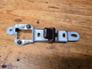 Toyota Supra MK3 1986.5-92 Front Drivers Power Door Lock Switch Bracket maroon - Picture 1 of 1