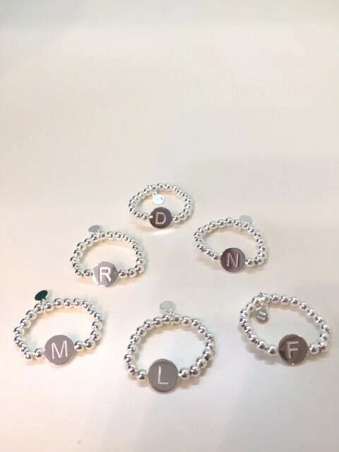 ANELLO ELASTICO ARGENTO CON INIZIALE LETTERA - Immagine 1 di 1