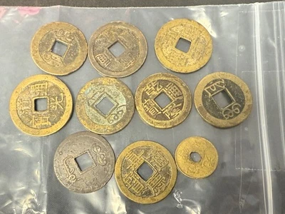 Lot of old Chinese tokens/coins not researched lot 398 - Image 1 of 2