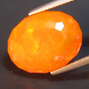 8.08Cts Natural Color Play Orange Opal 16x12.5mm Oval Custom Ethiopia Gemstone - Picture 1 of 4