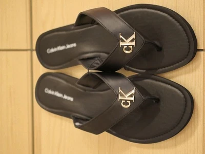 NEW WOMEN'S CALVIN KLEIN BLACK LEATHER WEDGE FLIP FLOP SANDAL GOLD CK JAIMZE 10 - Image 1 of 4