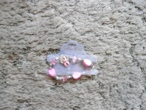 Neu mit Etikett Brustkrebs Bettelarmband - Bild 1 von 2