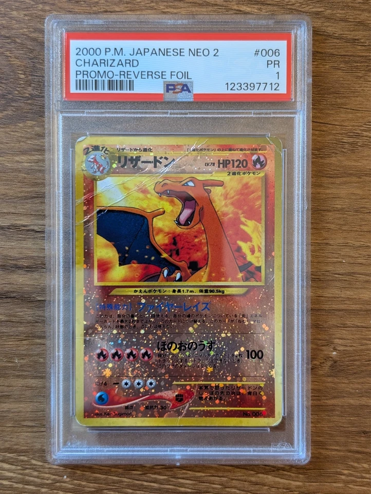 2000 Pokemon Japanese Neo 2 Promo PSA 1 Charizard Reverse Foil Holo #006 - Image 1 of 2