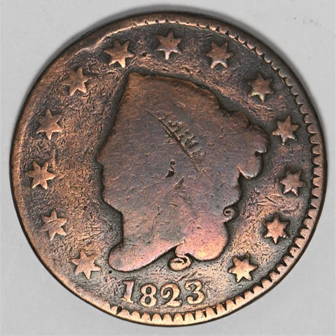 1823 large cent in a lower grade that is retoning Cover