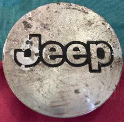 Tapa central Jeep Wrangler Grand Cherokee Compass Commander Liberty 5CF97TRM L3X 1 Foto 1 de 4