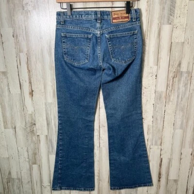 Pantalones de mezclilla acampanados vintage años 90 Y2K Paris azules tiro bajo pierna ancha EE. UU. para mujer talla 3 Foto 1 de 4